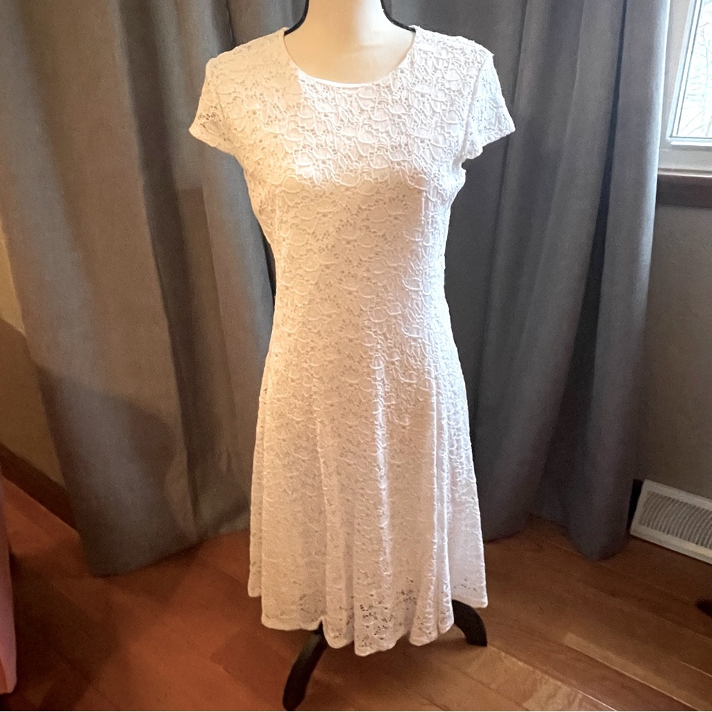 Ladies white lace fully lined dress, casual wear.